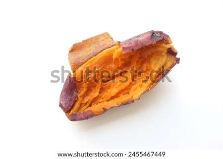 Hot Baked Organic Japanese Sweet Potatoes by air frier oven, diet and healthy food, isolated on white background. Boiled or grilled yellow sweet potato Royalty-Free Stock Photo #2455467449