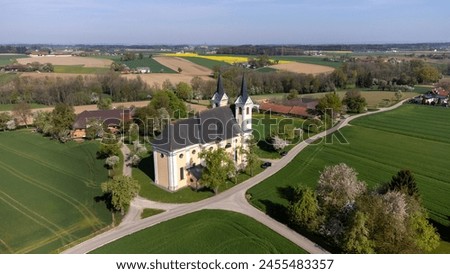 Heiligenkreuz , Upper Austria, Austria - 04.13.2024: church of Heiligenkreuz in Upper Austria, aerial photography