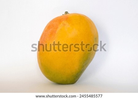 Fresh and juicy Ripe Mango on white background