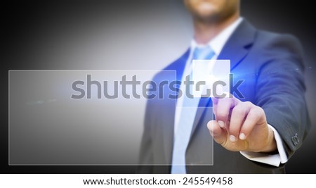Businessman using digital interface with his fingers