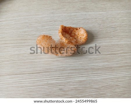 Spicy Acan crackers dance on your tongue Royalty-Free Stock Photo #2455499865