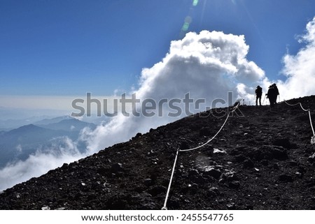 The ridge line of clouds seen from the top of Mt.Fuji  Royalty-Free Stock Photo #2455547765