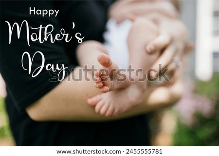 Mother's Day, new born baby in mother's hand, Cute little feet of baby, white text on image