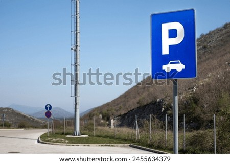 parking sign on the border of Montenegro and Bosnia in summer