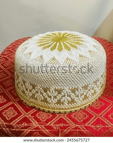 This is traditional wear of “Bohra Muslims” they call it Topi their women makes it at home by using threads. Royalty-Free Stock Photo #2455675727