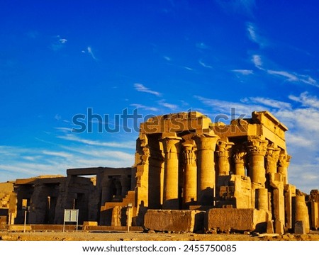 Magnificent view of the Kom Ombo temple on the banks of the Nile in the bright sun also known as Temple of Sobek and Haroeris built in 2nd century BC by Ptolemy pharoahs in Kom Ombo,Near Aswan,Egypt Royalty-Free Stock Photo #2455750085