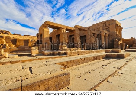 View of the ruins of the Kom Ombo temple dedicated to the crocodile headed Goddess Sobek at the Temple of Sobek and Haroeris built in 2nd century BC by Ptolemy pharoahs in Kom Ombo,Near Aswan,Egypt Royalty-Free Stock Photo #2455750117