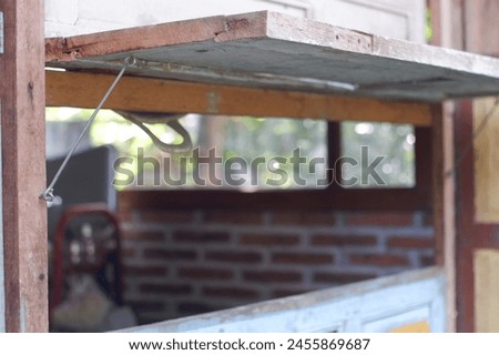 homy, wooden house, look green, Indonesia, April 30, 2024 Royalty-Free Stock Photo #2455869687