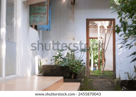 homy, wooden house, look green, Indonesia, April 30, 2024 Royalty-Free Stock Photo #2455870043