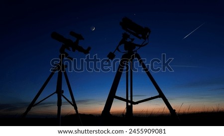 Astronomical telescope and camera on a startracker tripod for observing and capturing stars, planets, Moon and other cosmic celestial objects.
