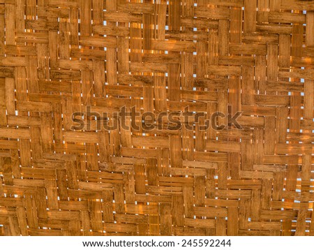 Palm mat. Wall of woven palm leaves.
