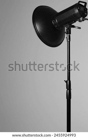 Photo Studio Equipment. Beauty Dish Modifier on White Cyclorama. Fashion Shoot Light.