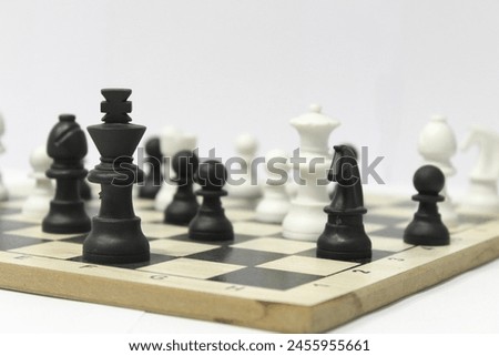 chess consisting of black and white pieces
