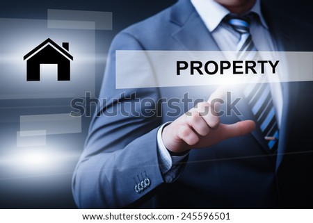business, technology and internet concept - businessman pressing property button on virtual screens