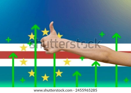 Cape Verde flag with green up arrows, country statistics concept, increasing values and improving economy, finger thumbs up front of Cape Verde flag, upward rising arrow on data