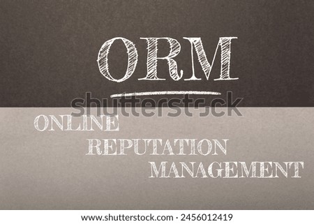 A chalkboard with the acronym ORM written on it, possibly indicating a topic related to online reputation management or another context where ORM is relevant.