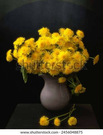 Bouquet of dandelion  flowers in a vase