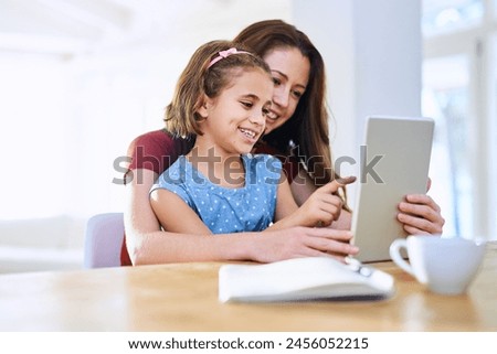 Mother, girl and tablet for learning at table, online play and remote homeschool or education in home. Daughter, mama and streaming cartoon or app for development, bonding and support in childhood