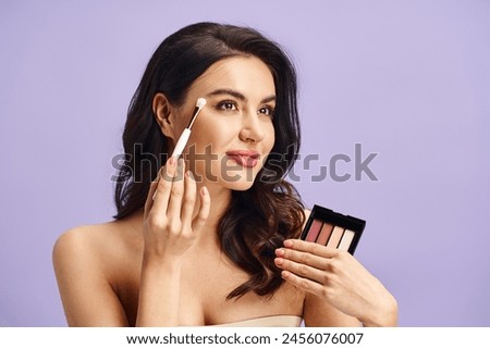 A woman enhancing her natural beauty, holding a brush and powder in front of her face.