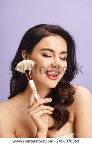 A woman with a brush in hand, enhancing her natural beauty with makeup.