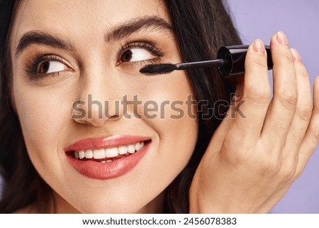 Woman enhancing her eyes with a mascara, adding a touch of elegance and allure.