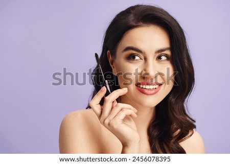 A woman with natural beauty holds mascara to her face.