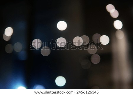 Beautiful photos of lights at night using certain techniques to produce round lights that are slightly out of focus and the background is blurry