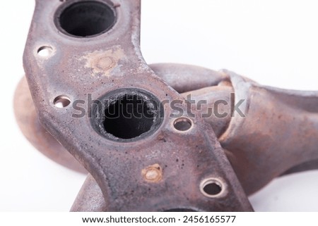 A automotive exhaust manifold with catalyst isolated on white. Exhaust manifold car stock pictures, royalty-free photos, images