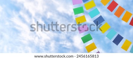 Garlands with colorful flags outdoors. Banner for Cinco de Mayo celebration