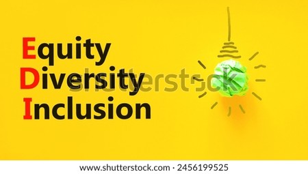 EDI equity diversity inclusion symbol. Concept words EDI equity diversity inclusion on yellow paper on beautiful yellow background. Business EDI equity diversity inclusion concept. Copy space.