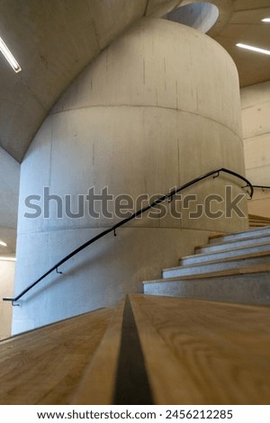 Industrial Chic Staircase: Architectural Concrete and Timber.