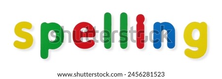 Spelling word in coloured magnetic letters