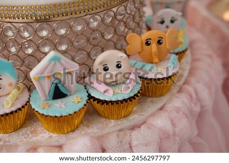 Photography of cupcackes and snacks for children's party with circus theme.