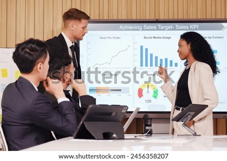 Businessman and employee meeting to plan marketing business investment.