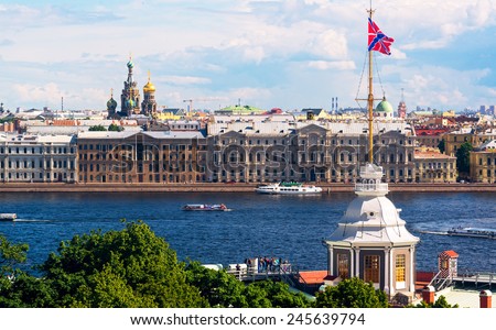 Saint Petersburg skyline, Russia. Tourist boats sail on Neva River in summer. St Petersburg is one of top Russian travel destinations. Scenery of Saint Petersburg buildings. Tourism theme. Royalty-Free Stock Photo #245639794