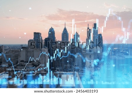 Double exposure of financial graphs superimposed on a cityscape, representing Philadelphia's skyline with a concept of business and technology. Double exposure Royalty-Free Stock Photo #2456403193