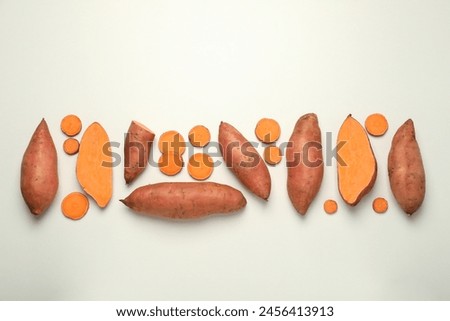 Fresh cut sweet potato on a light background