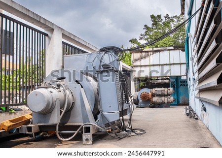 about testing gear motors of the tower crane hoist at a workshop Royalty-Free Stock Photo #2456447991