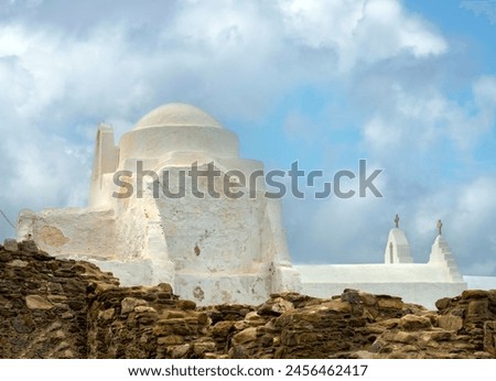 The poetic beauty of the traditional white washed Greek orthodox churches in Mykonos, Cyclades Islands, Aegean Sea, Greece