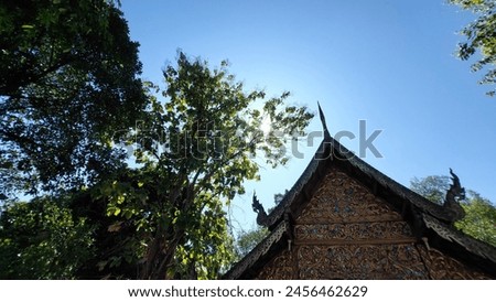Outdoor view of temple building under full sun sky background, Wat Chiang Man