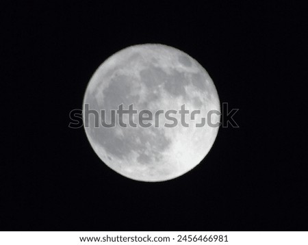 The image is a close-up of the moon, showcasing its details and texture. It captures the beauty of the celestial object in the night sky.
