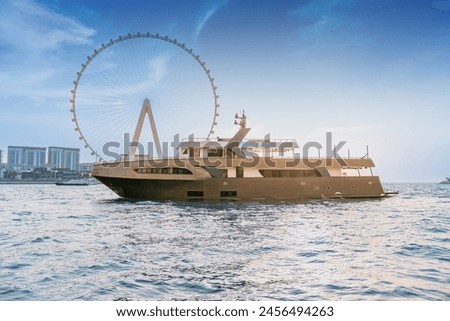 A luxury super yacht cruising in sea Royalty-Free Stock Photo #2456494263