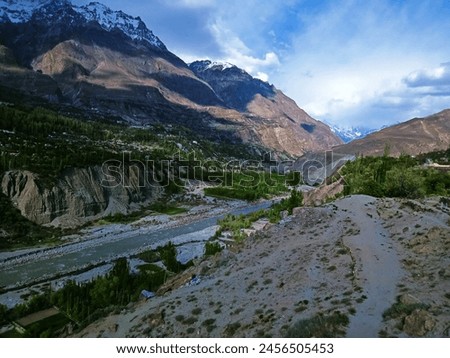 Picture of hunza valley
Hunza Valley Majestic mountain panorama with glacier Serene landscape vibrant colors Nature's grandeur captured Ideal for travel, adventure, and exploration concepts