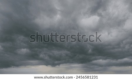 Heavy rain is coming. Cumulus dark clouds harbinger of bad weather and heavy rains. Timelapse. Royalty-Free Stock Photo #2456581231