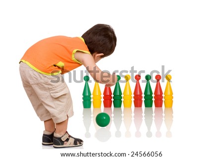 Bowling game, a child throws a ball