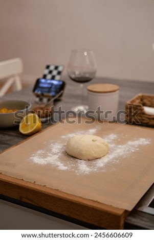 Pizza dough, movie evening, red wine, lemon, recipe, homemade pizza Royalty-Free Stock Photo #2456606609