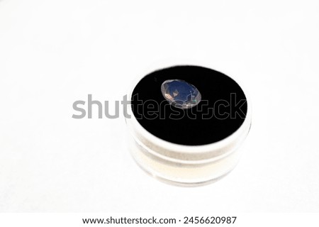 Natural precious gemstone Opal on a white background
