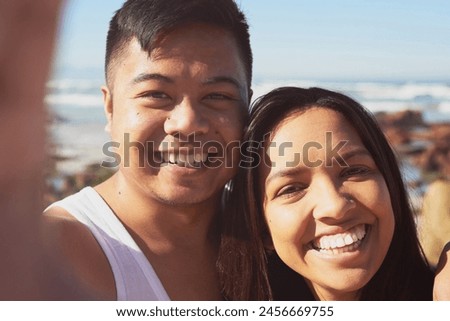 Smiling, couple and selfie at beach in Mexico for memory, vacation and holiday in nature. Ocean, man and woman together in love with relaxation, adventure and romance for profile picture in summer
