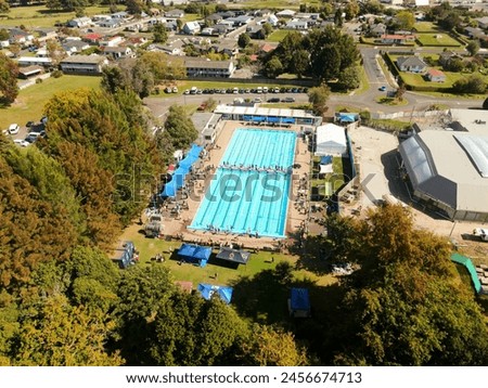 Rotorua Aquatic centre during a school swimming sports event Royalty-Free Stock Photo #2456674713