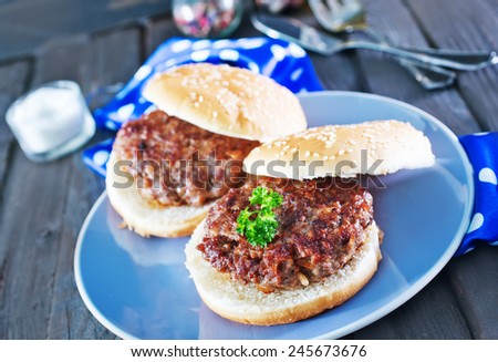 cutlets with bread on plate and on a table